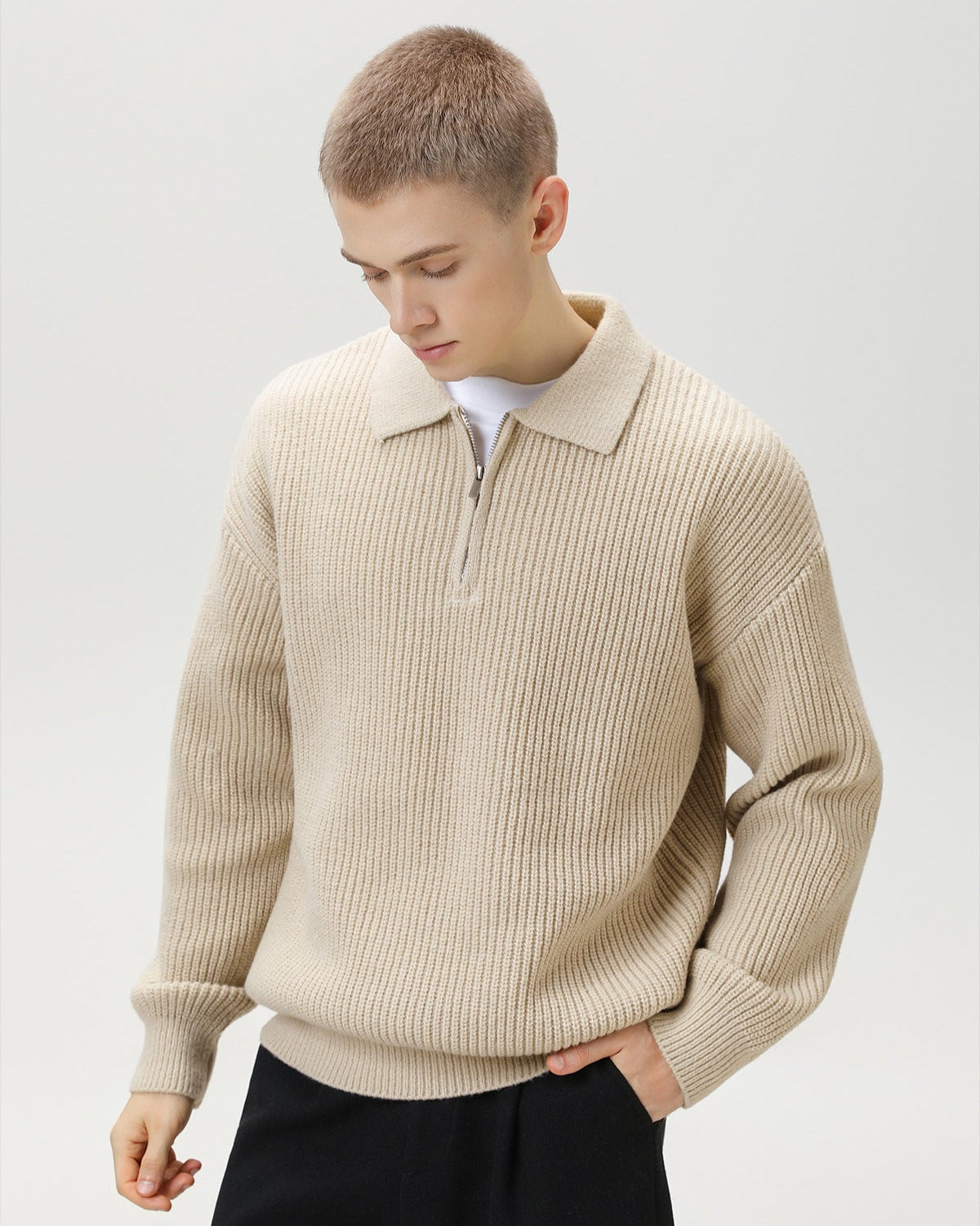 Pull polo en maille côtelée à demi-zip